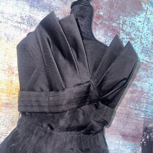 Little Black Dress. Gorgeous strapless black dress. Back zip and clasp closure.